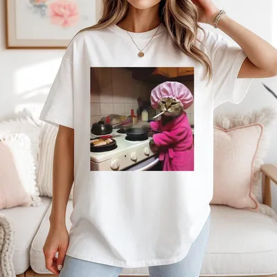 Funny Cooking Cat T-Shirt Sassy Cat In Pink Robe Graphic Quirky And Humorous Casual T-Shirt For Cat Lovers
