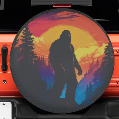 Bigfoot Silhouette Spare Tire Cover, Sunset Forest Sasquatch Art, Vibrant Outdoors Universal Fit, Waterproof Cryptid Protector Spare Tire Cover
