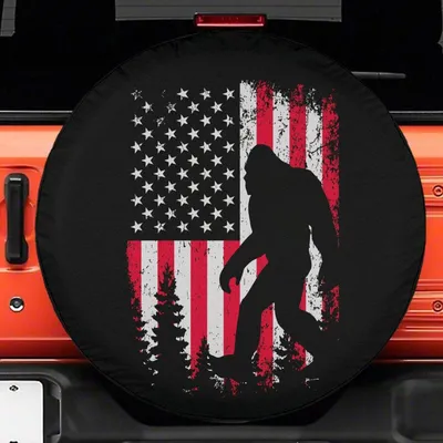 Bigfoot Spare Tire Cover, American Flag Grunge Design, Sasquatch Forest Silhouette, Patriotic Off-Road Accessory, Backup Camera Hole Option Spare Tire Cover