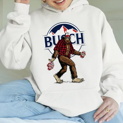 Busch Light Apple Sasquatch Hunting Hoodie, Large Sasquatch In Plaid Hoodie Carrying Busch Beer