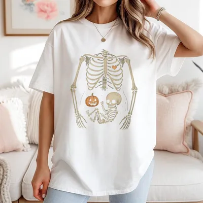 Skeleton Halloween Maternity T-Shirt Unisex Funny Pregnancy Announcement 2025 T-Shirt Spooky Pregnant Costume New